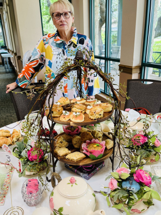 Barbara Cooper served as a tablescaper and host for a May tea party. Photo by Linda Dwyer
