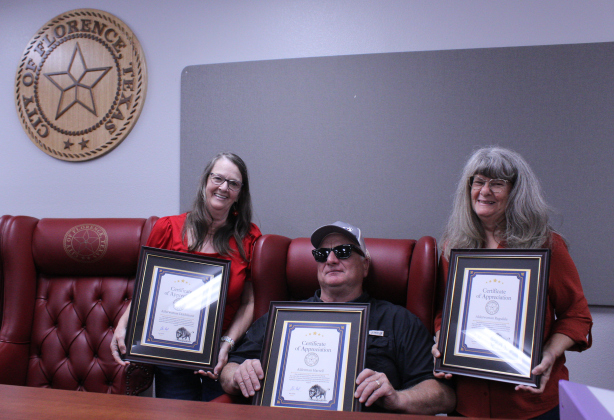  Council members, from left, Denise Diechmann, Mike Harrell and Lesa Ragsdel received a certificate of appreciation from the City of Florence for their years of service on the council. Photo by Nalani Nuylan.