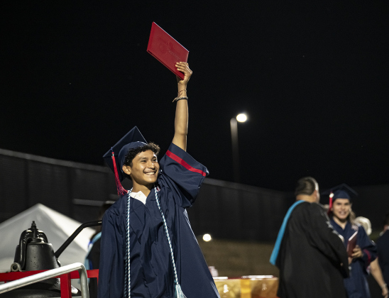 Ricardo Lopez celebrates after receiving his diploma  during commencement for East View High School at the Georgetown ISD Athletic Complex on Friday, May 23, 2025.  489 East View seniors received their diplomas.    Photo by Andy Sharp.