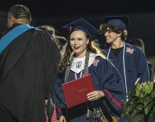 Andra Elizabeth Murphy, a National Honor Society member, smiles after receiving her diploma during commencement for East View High School at the Georgetown ISD Athletic Complex on Friday, May 23, 2025.  489 East View seniors received their diplomas.    Photo by Andy Sharp.