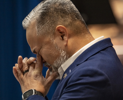 Retired Army Major Jay Lardizabal, the keynote speaker, who served as a Green Beret and in Special Forces, is emotional as he remembers the loss of fellow soldiers and friends during  the Memorial Day ceremony in Sun City on Monday, May 26, 2025.  Approximately 600 were in attendance.  Rain chances moved the event indoors.   Photo by Andy Sharp.