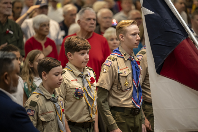 Scouting America Troop 350 (along with Girl Scout Troops 317 and 254) helped lead the Pledge of Allegiance during  the Memorial Day ceremony in Sun City on Monday, May 26, 2025.  Approximately 600 were in attendance.  Rain chances moved the event indoors.   Photo by Andy Sharp.