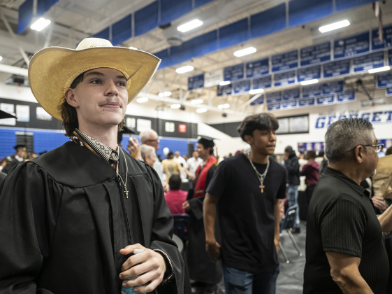 Graduating senior Cayden Warthan switched his mortarboard for a cowboy hat during the reception after receiving his diploma at  the Richarte High School commencement ceremony.