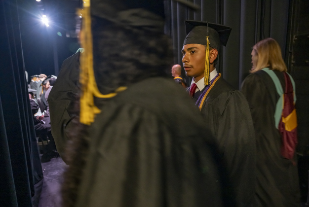 Jorge Garcia prepares to join his classmates backstage  during the Richarte High School commencement ceremony held at the Klett Performing Arts Center  on Thursday, May 22, 2025.