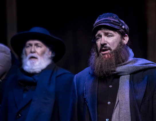 Michael Rafferty, back left, as the Rabbi, and Brian Joyce, as Tevye, are shown in a photo from the dress rehearsal for the Palace production of “Fiddler on the Roof”  on Thursday, May 29, 2025.  The play will run through July 6th on the Springer main stage.    Photo by Andy Sharp.