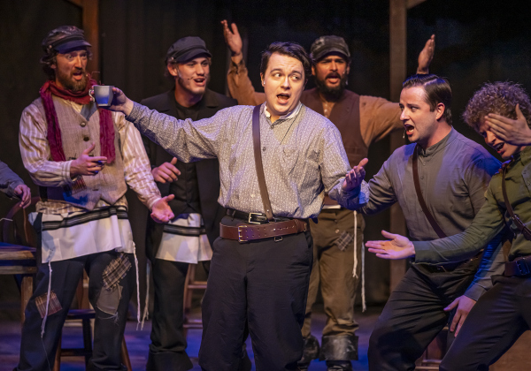 Isaac Howell, center, playing Fyedka,  is shown in a photo from the dress rehearsal for the Palace production of “Fiddler on the Roof”  on Thursday, May 29, 2025.  The play will run through July 6th on the Springer main stage.    Photo by Andy Sharp.