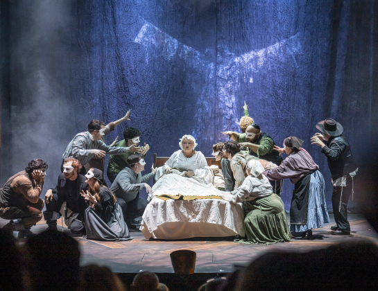Annie Fizzell, in bed, as Golde,  is shown in a photo from the dress rehearsal for the Palace production of “Fiddler on the Roof”  on Thursday, May 29, 2025.  The play will run through July 6th on the Springer main stage.    Photo by Andy Sharp.  