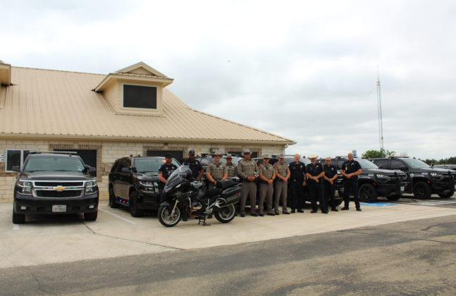 The Florence Police Department is joined by the Williamson County Constable Precinct 3, the Williamson County Sheriff’s Office and the Texas Department of Public Safety outside Florence City Hall for the first “Operation Safe Start” initiative, May 29. Photo by Nalani Nuylan.