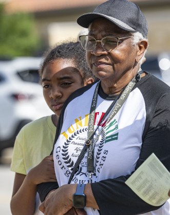 10-year-old Rylie Thomas stands with her great-aunt Frances Cunningham at  the unveiling of an historical marker at Citizens Memorial Garden Cemetery during a ceremony held  on Juneteenth, Thursday, June 19, 2025.