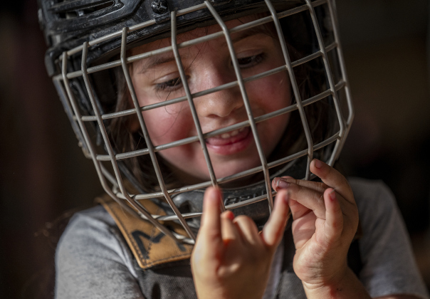 4-year-old Stella Reyna of Killeen, wearing her protective gear, is ready to compete in Mutton Bustin’ at  the Bill Pickett Youth Rodeo, held at the Williamson County Expo Center  on Saturday, June 21, 2025.  Now in its second year, the rodeo showcases athletes 18 or younger. The event is coordinated by the Bill Pickett Youth Rodeo Association.     Photo by Andy Sharp.