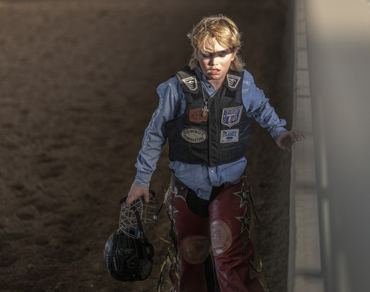 12-year-old Shilow Wilson of Coldspring, Texas winds down after competing in saddle bronc riding at  the Bill Pickett Youth Rodeo, held at the Williamson County Expo Center  on Saturday, June 21, 2025.  Now in its second year, the rodeo showcases athletes 18 or younger. The event is coordinated by the Bill Pickett Youth Rodeo Association.     Photo by Andy Sharp.