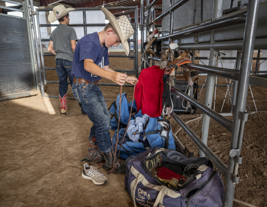 11-year-old Garrett Nalley, a bareback rider from Rochelle, Texas, gets ready for competition  during the Bill Pickett Youth Rodeo, held at the Williamson County Expo Center  on Saturday, June 21, 2025.  Now in its second year, the rodeo showcases athletes 18 or younger. The event is coordinated by the Bill Pickett Youth Rodeo Association.     Photo by Andy Sharp.