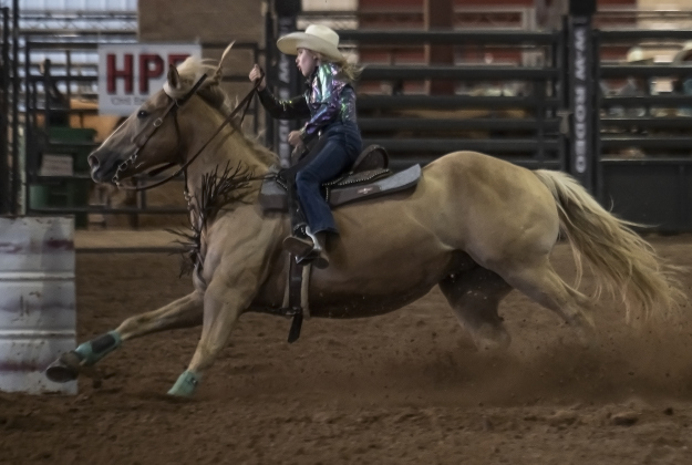 11-year-old Tylee Tuerck competes in barrel racing at the Bill Pickett Youth Rodeo, held at the Williamson County Expo Center  on Saturday, June 21, 2025.  Now in its second year, the rodeo showcases athletes 18 or younger. The event is coordinated by the Bill Pickett Youth Rodeo Association.     Photo by Andy Sharp.