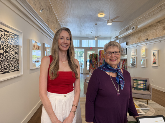 Christina Sharp (left), the co-owner of The Vera Gallery, stands with Jan Kendall, a gallery employees who used to work at The Georgetown Antique Mall. Photo by Abbey Archer