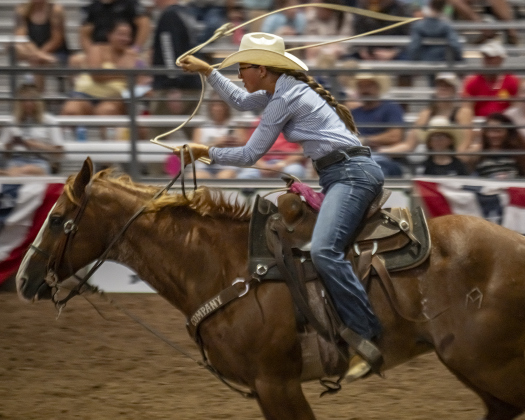Madison Murray of Cooper, Texas competes in Breakaway Roping at the  75th Annual Taylor Rodeo on Thursday, July 17,2025.  Coordinated by the Taylor Rodeo Association, the three-night rodeo is held at the Williamson County Expo Center.   Photo by Andy Sharp.