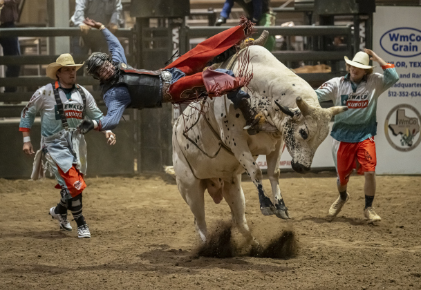 Dakota Hill of Bagwell, Texas competes in Bull Riding  at the  75th Annual Taylor Rodeo on Thursday, July 17,2025.  Coordinated by the Taylor Rodeo Association, the three-night rodeo is held at the Williamson County Expo Center.   Photo by Andy Sharp.