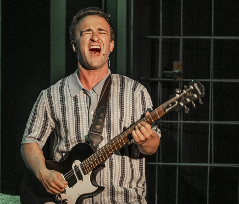 Sean Themea, playing Barry Mann, is  pictured in a scene from “Beautiful: The Carole King Musical” on Thursday, July 24, 2025.  The production runs through August 31st on the Georgetown Palace Springer Stage.   Photo by Andy Sharp.