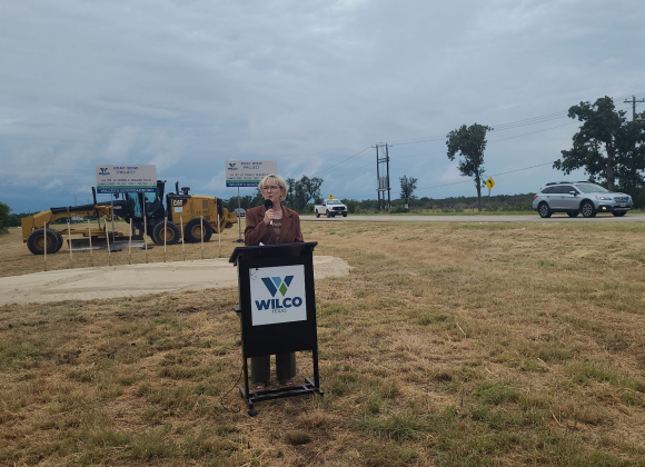 County Commissioner Valarie Covey gives a speech about the State Highway 195 at Ronald Reagan Boulevard ramp project in northwest Georgetown, Monday morning. Photo by Nalani Nuylan.