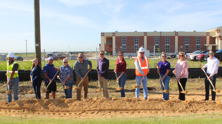 Cullen Harrison, Lone Star Sitework LLC; Caroline Harris Davila, state representative; Roman Ramirez, Granger ISD trustee; Bruce Waggoner, mayor of Granger; Russ Boles, Commissioner, Pct. 4; Steven Brosch, Granger ISD superintendent; Dana Ladzinski, HNTB; Chuck Evans, HNTB; Erin Lawrence, Granger Elementary School principal; Tawnya Shirocky, Granger High School principal; and Aaron Mullins, Project Control. Photo courtesy of Williamson County.