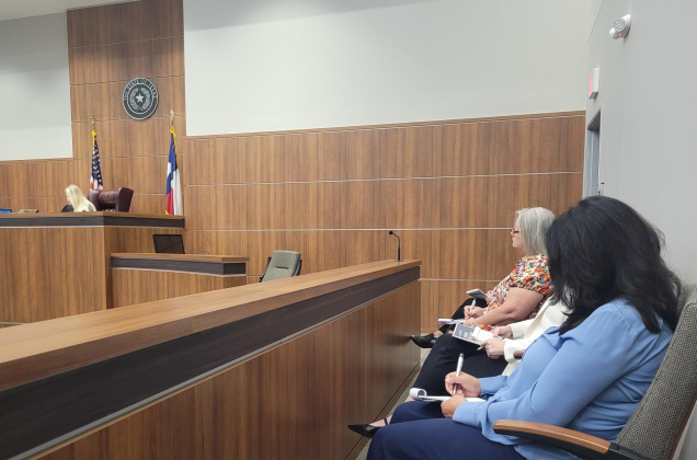 Participants take notes during an eviction hearing at the JP3 court. Photo by Nalani Nuylan.