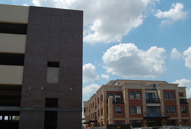 The new brick color is darker than the Tamiro building, seen on the right, was chosen so it didn’t blend into the other building. (Photo by Kaitlyn Wilkes)