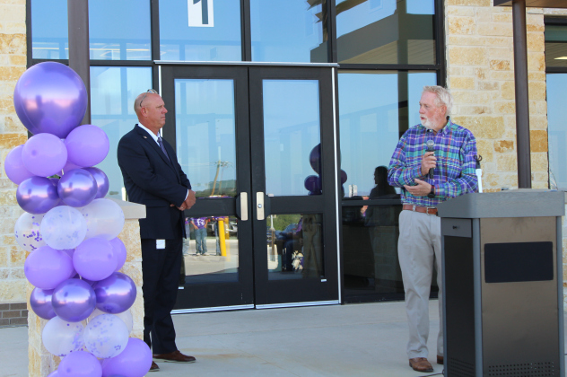 Barry Nevitt from VLK Architects, right, thanks the Florence community for trusting the firm with building the new school.
