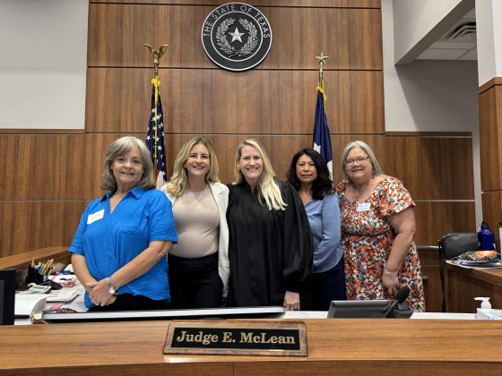 Precinct 3 residents pose with Judge McLean as a part of "Judge for a Day" shadowing program.