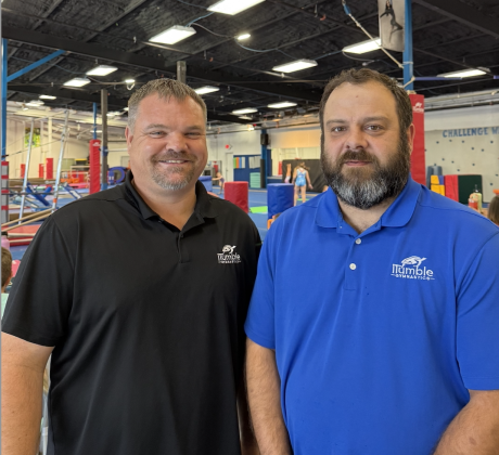 Jake Clear, owner of iTumble (left), Keith Selvera (right) Head Girls Coach standing in front of gymnastics tumbling area. Photo by Abbey Archer