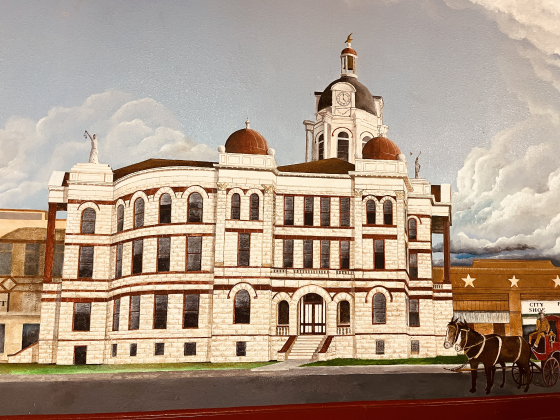 A mural shows the old county courthouse.
