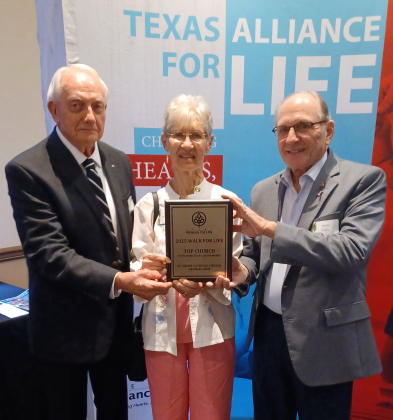 Robert Rauschuber, Judy Whitfield and Danny Cable accepted the Texas Alliance Walk for Life’s Top Church award on behalf of the parish.  Photo courtesy Danny Cable