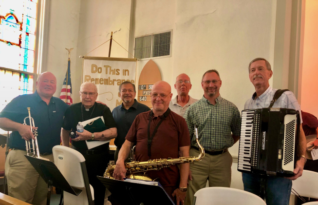 Praha Brothers Polka Band members, from left to right are Billy Havlik, the late Rev. Ardene Wuthrich, David Fraga, Russell Kalkbrenner, Tom Jones, Bernard Strmiska, and Jerry Haislera, perform a recent Polka Worship at St. John Lutheran Church in Bartlett. Photo courtesy of Ronnie Persky.