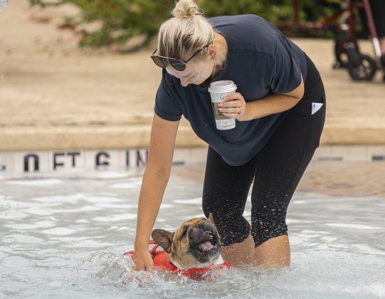 Melissa Barrett spent time in the water with her dog named Monty during K-9 Kerplunk, held in the outdoor pool at the Georgetown Recreation Center on Saturday, September 6, 2025.