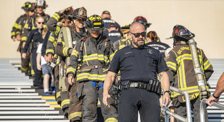 Georgetown  Police Chief Cory Tchida joins fellow first responders during the Memorial Stair Climb at Birkelbach Field on Thursday, September 11, 2025,  commemorating the 24th anniversary of the attacks on United States soil on September 11, 2001.