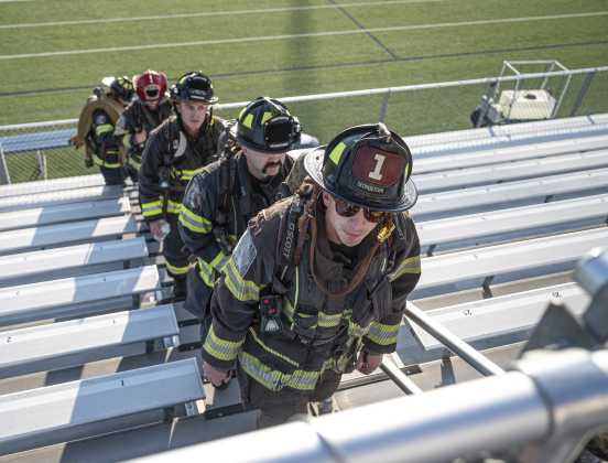Georgetown first responders climb the stadium steps at Birkelbach Field during the Memorial Stair Climb on Thursday, September 11, 2025, commemorating the 24th anniversary of the attacks on United States soil on September 11, 2001.