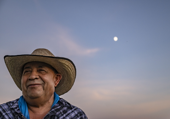Rosalio Rodriguez, who will be 71 on September 13th, relaxes after herding  his 60 head of sheep along the lightly-traveled County Road 345 south of Granger on Tuesday, September 2, 2025.