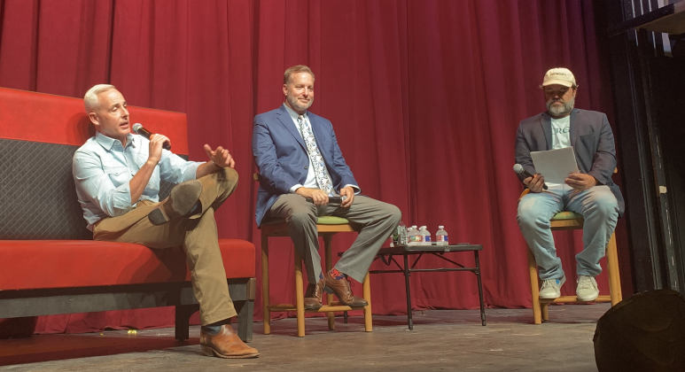 Georgetown Mayor Josh Schroeder, left, and County Judge Steven Snell, center, spoke about development in Georgetown and the county at a panel hosted by Glenn Hart, right. (Photo by Kaitlyn Wilkes)