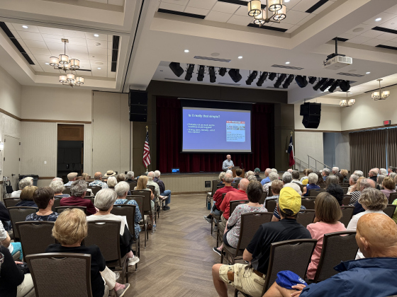 Dr. Jared Benge gives an aging presentation September 26 to an audience of 220 Sun City residents. Photo by Abbey Archer