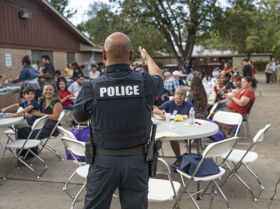 Georgetown Police Department officer Cesar Salinas  spoke to attendees at the National Night Out observance held at the Georgetown Housing AuthorityÕs Stonehaven site  on Tuesday, October 7, 2025.