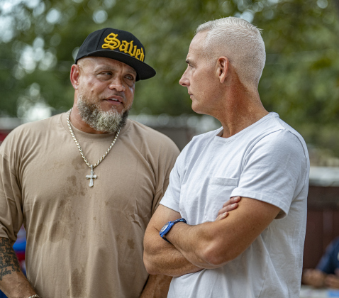 Pablo Groves, left, chats with Georgetown Mayor Josh Schroeder  at the National Night Out observance held at the Georgetown Housing Authority’s Stonehaven site  on Tuesday, October 7, 2025.  Photo by Andy Sharp.