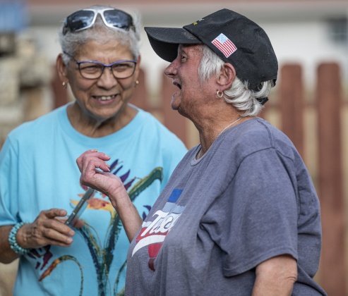 Aurora DeLao, left, and Terri Nunis were  attendees at the National Night Out observance held at the Georgetown Housing Authority’s Stonehaven site  on Tuesday, October 7, 2025.  Photo by Andy Sharp.