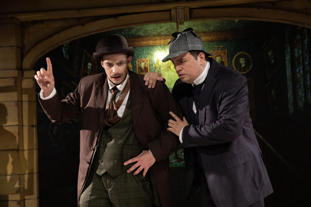 Parker Couch (left) as Dr. John Watson and Robert Slack (right) as Sherlock Holmes star in Baskerville, a Sherlock Holmes Mystery.