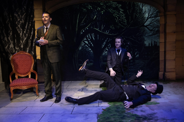 Parker Couch and Robert Slack investigate a scene with Erik Powers (floor) performing as Actor 2.