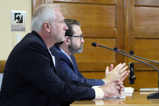 Scott Matthew, Williamson County’s executive director of Juvenile Services, front, is joined by Judge Ryan Larson of the 395th District Court, back, to answer questions about funding juvenile programs through grants. Photo by Nalani Nuylan.