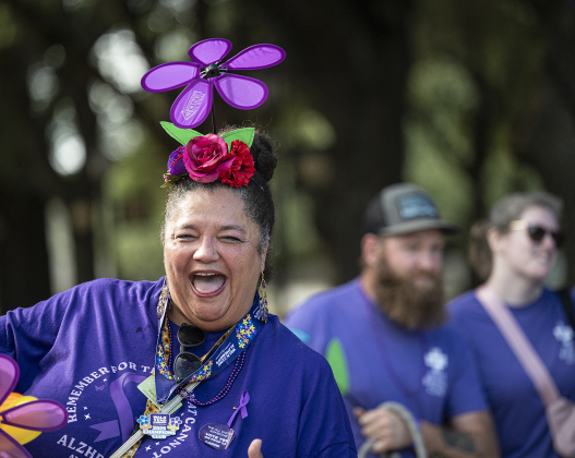 Marcy Wintle, Activities Director for The Haven At San Gabriel, smiles as she crosses the finish line in the Walk to End Alzheimer’s, held at Southwestern University on  Saturday morning, October 18, 2025.  The event was coordinated by the Alzheimer’s Association Capital of Texas Chapter.   Photo by Andy Sharp.