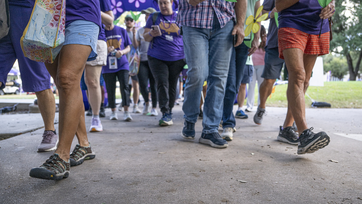 Some of the 500-600 participants  begin their one-mile walk during the Walk to End Alzheimer’s, held at Southwestern University on  Saturday morning, October 18, 2025.  The event was coordinated by the Alzheimer’s Association Capital of Texas Chapter.   Photo by Andy Sharp.