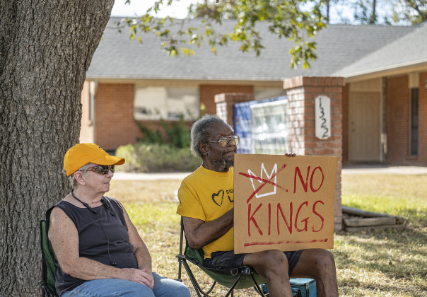 Bonnie MacKinnon and Kenneth Hoke Witherspoon hold a quiet “No Kings” protest from their chairs in front of San Gabriel Unitarian Universalist Fellowship on Saturday, October 18, 2025.   Photo by Andy Sharp.
