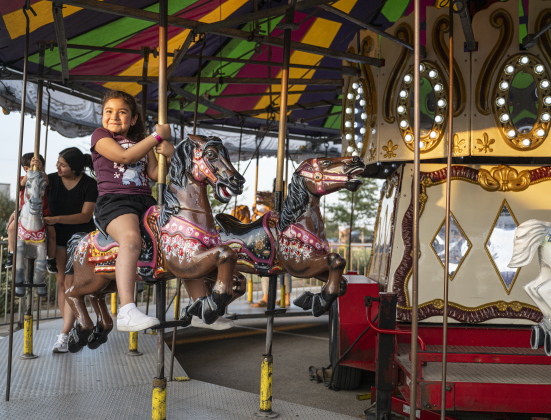 8-year-old Peyton Garcia enjoys a carousel ride at the Williamson County Fair on Wednesday, October 22, 2025. Held at the Williamson County Expo Center, the fair and rodeo continues through Saturday.   Photo by Andy Sharp.