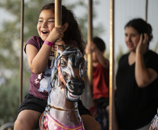 8-year-old Peyton Garcia enjoys a carousel ride at the Williamson County Fair on Wednesday, October 22, 2025. Held at the Williamson County Expo Center, the fair and rodeo continues through Saturday.   Photo by Andy Sharp.