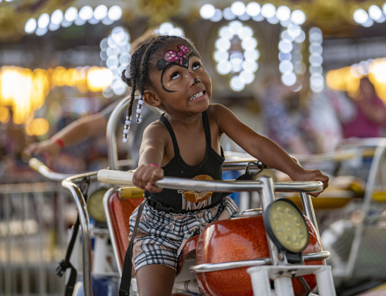 3-year-old Myla Hayes enjoys a carnival ride  at the Williamson County Fair on Wednesday, October 22, 2025. Held at the Williamson County Expo Center, the fair and rodeo continues through Saturday.   Photo by Andy Sharp.