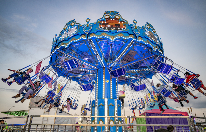 Fair attendees enjoy a ride on the Super Swing at the Williamson County Fair on Wednesday, October 22, 2025. Held at the Williamson County Expo Center, the fair and rodeo continues through Saturday.   Photo by Andy Sharp.